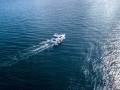 aerial motor boat isolated on a sea surface on a summer cruise trip